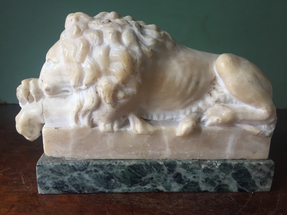 Pair of C19th Italian carved alabaster 'Grand Tour' souvenir lions after Antonio Canova . View V