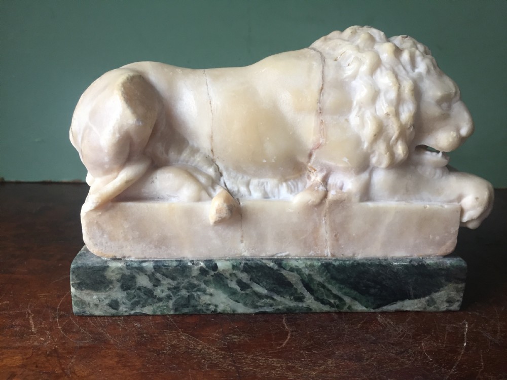 Pair of C19th Italian carved alabaster 'Grand Tour' souvenir lions after Antonio Canova . View IX