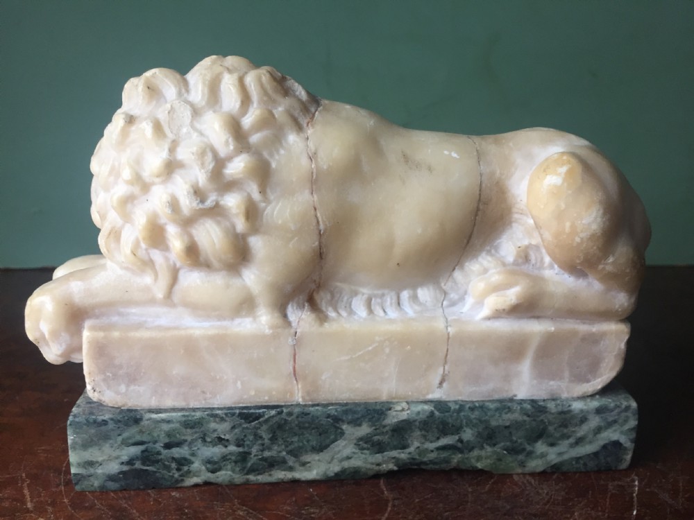 Pair of C19th Italian carved alabaster 'Grand Tour' souvenir lions after Antonio Canova . View X