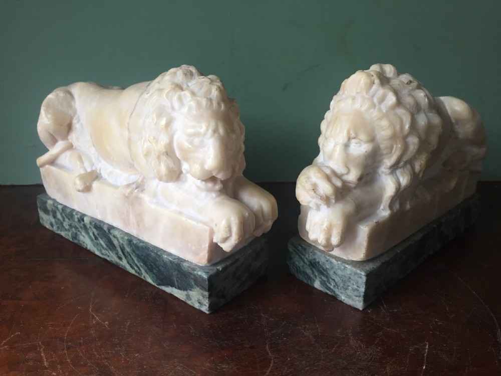 Pair of C19th Italian carved alabaster 'Grand Tour' souvenir lions after Antonio Canova . View XVI