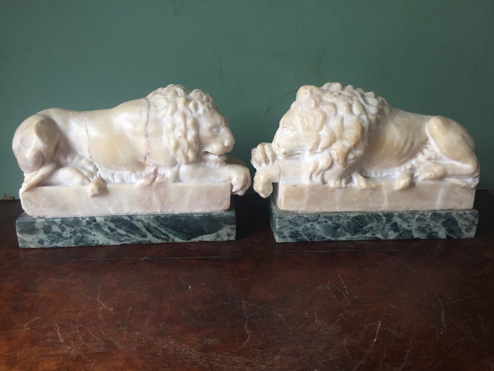 Pair of C19th Italian carved alabaster 'Grand Tour' souvenir lions after Antonio Canova . View XVIII