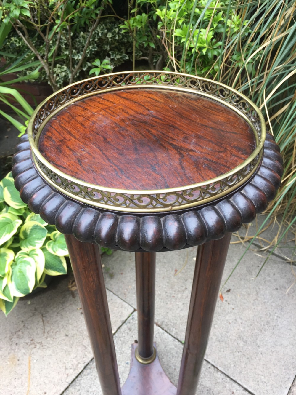 Early C19th George IV period gilt-brass mounted rosewood torchere  of Empire design. View IV