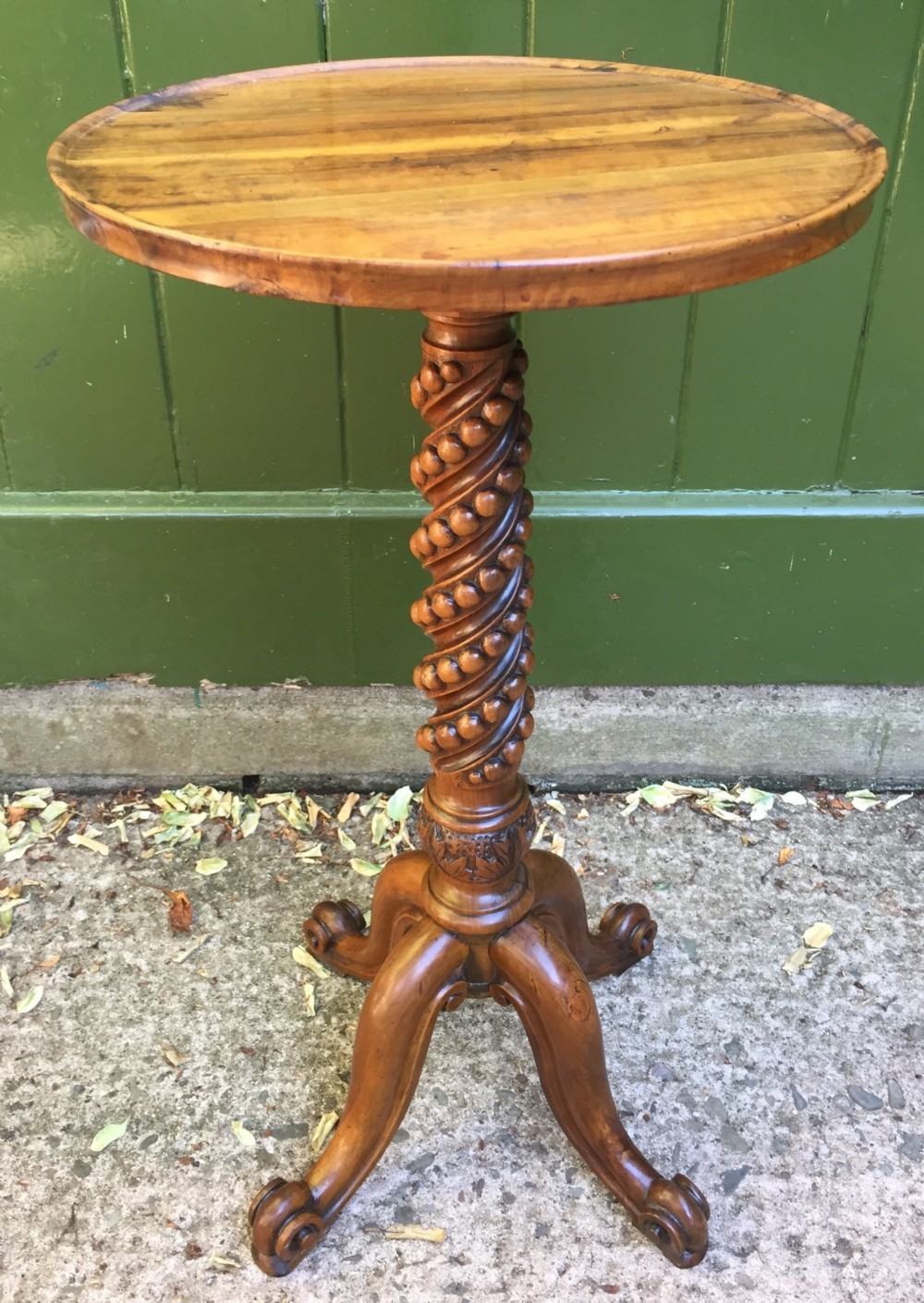 Rare mid C19th olive-wood wine table or candle-stand on a quadruple support base. 