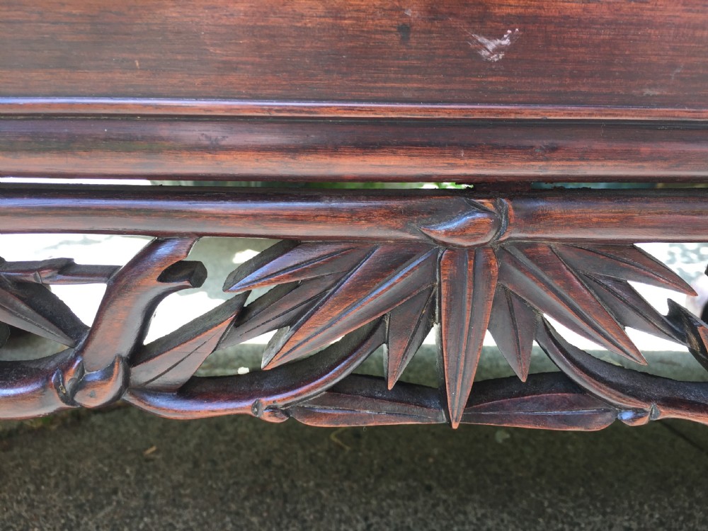 Late C19th Chinese Qing Dynasty carved hardwood 'kang' or opium table of scroll-end design. View XI