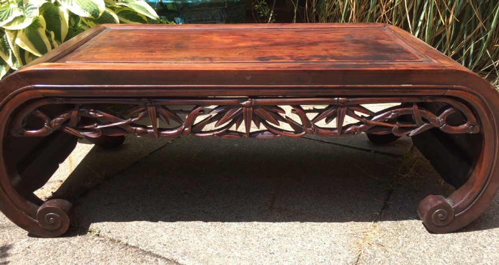 Late C19th Chinese Qing Dynasty carved hardwood 'kang' or opium table of scroll-end design. View XIII