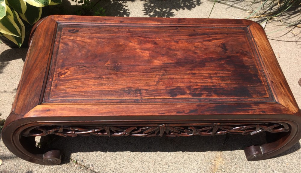 Late C19th Chinese Qing Dynasty carved hardwood 'kang' or opium table of scroll-end design. View XV