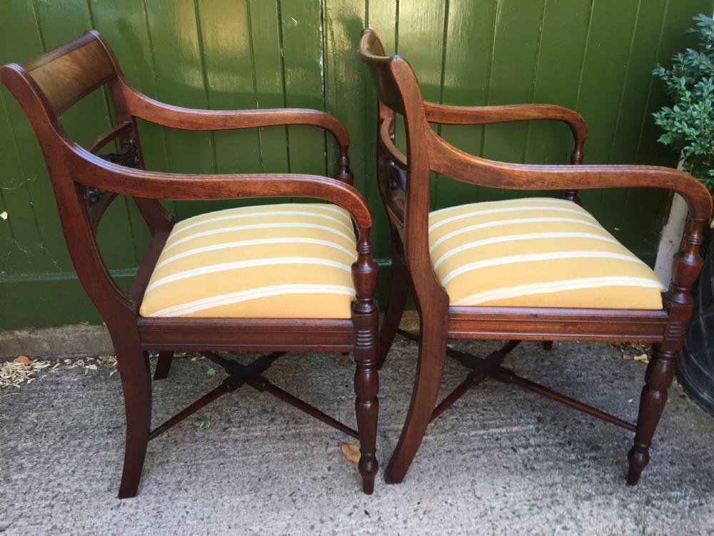 Fine set of 10 early C19th Scottish Regency period mahogany dining chairs. View XVI