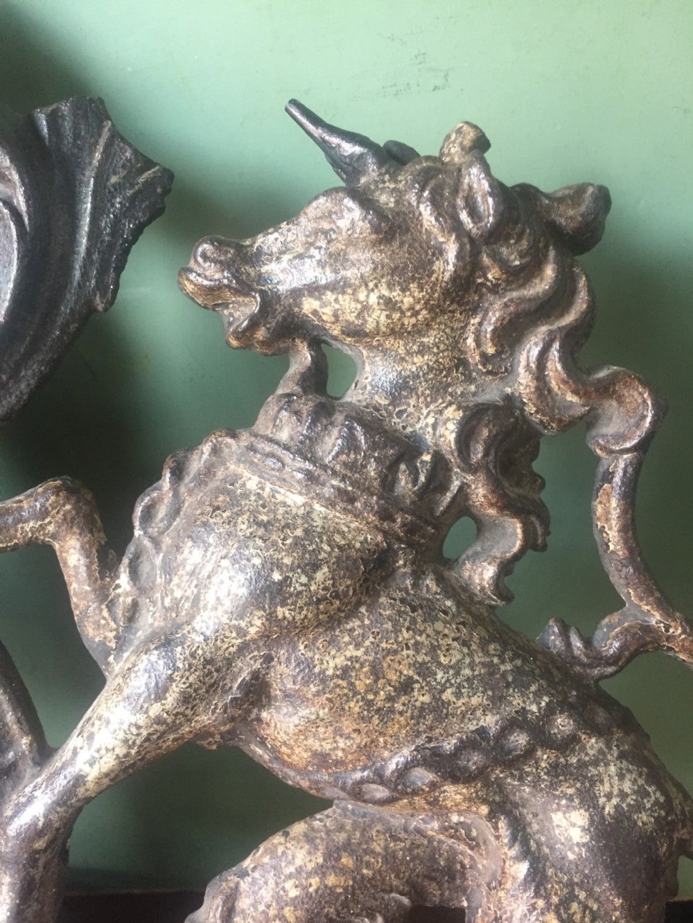 Mid C19th British cast-iron 'coat of arms' or Royal cypher with traces of original polychrome painted decoration. View V