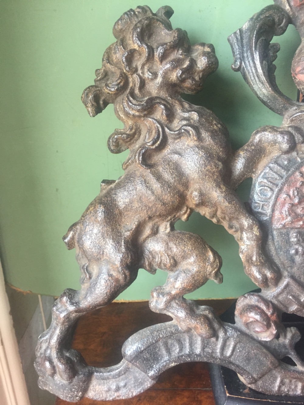 Mid C19th British cast-iron 'coat of arms' or Royal cypher with traces of original polychrome painted decoration. View IX