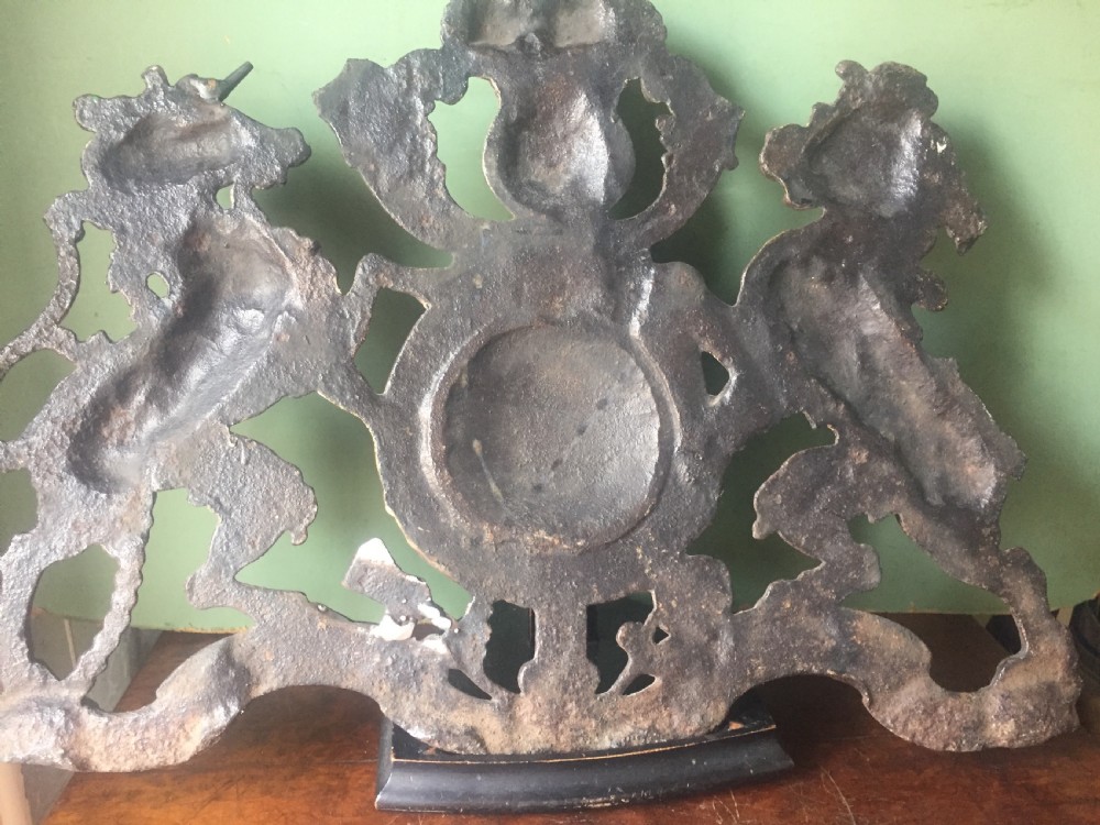 Mid C19th British cast-iron 'coat of arms' or Royal cypher with traces of original polychrome painted decoration. View XII