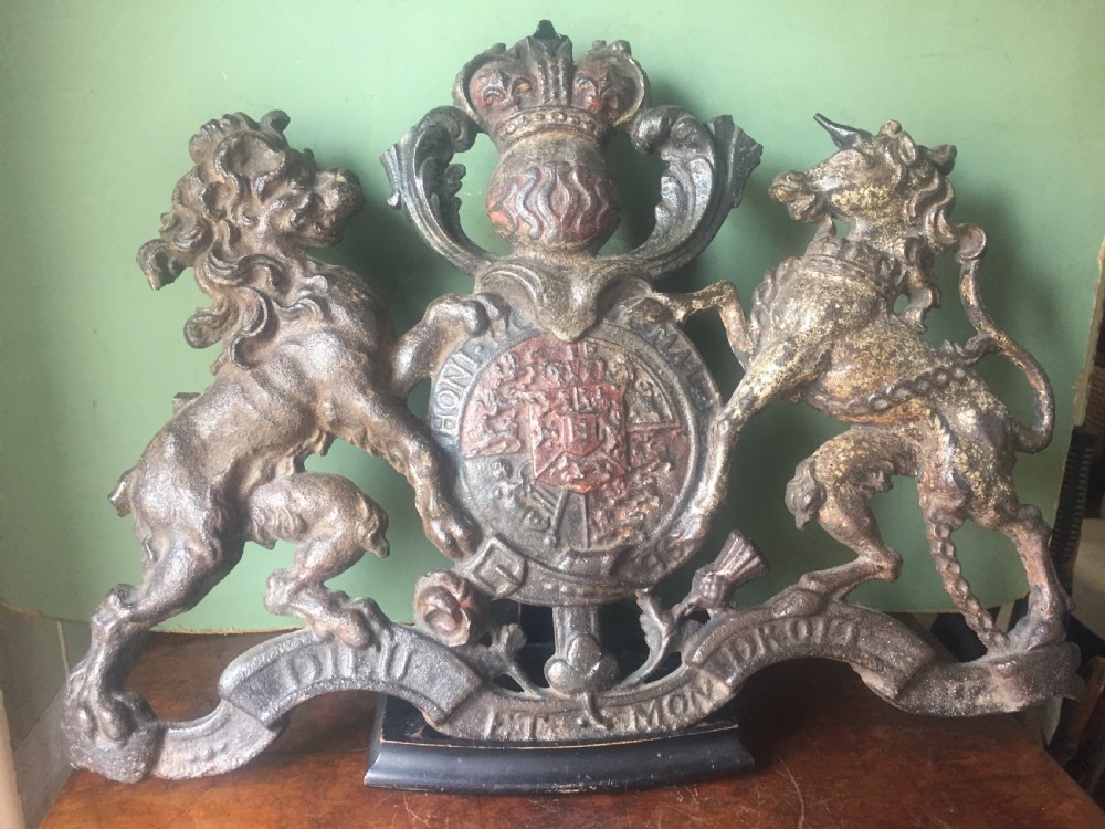 Mid C19th British cast-iron 'coat of arms' or Royal cypher with traces of original polychrome painted decoration. View XIII