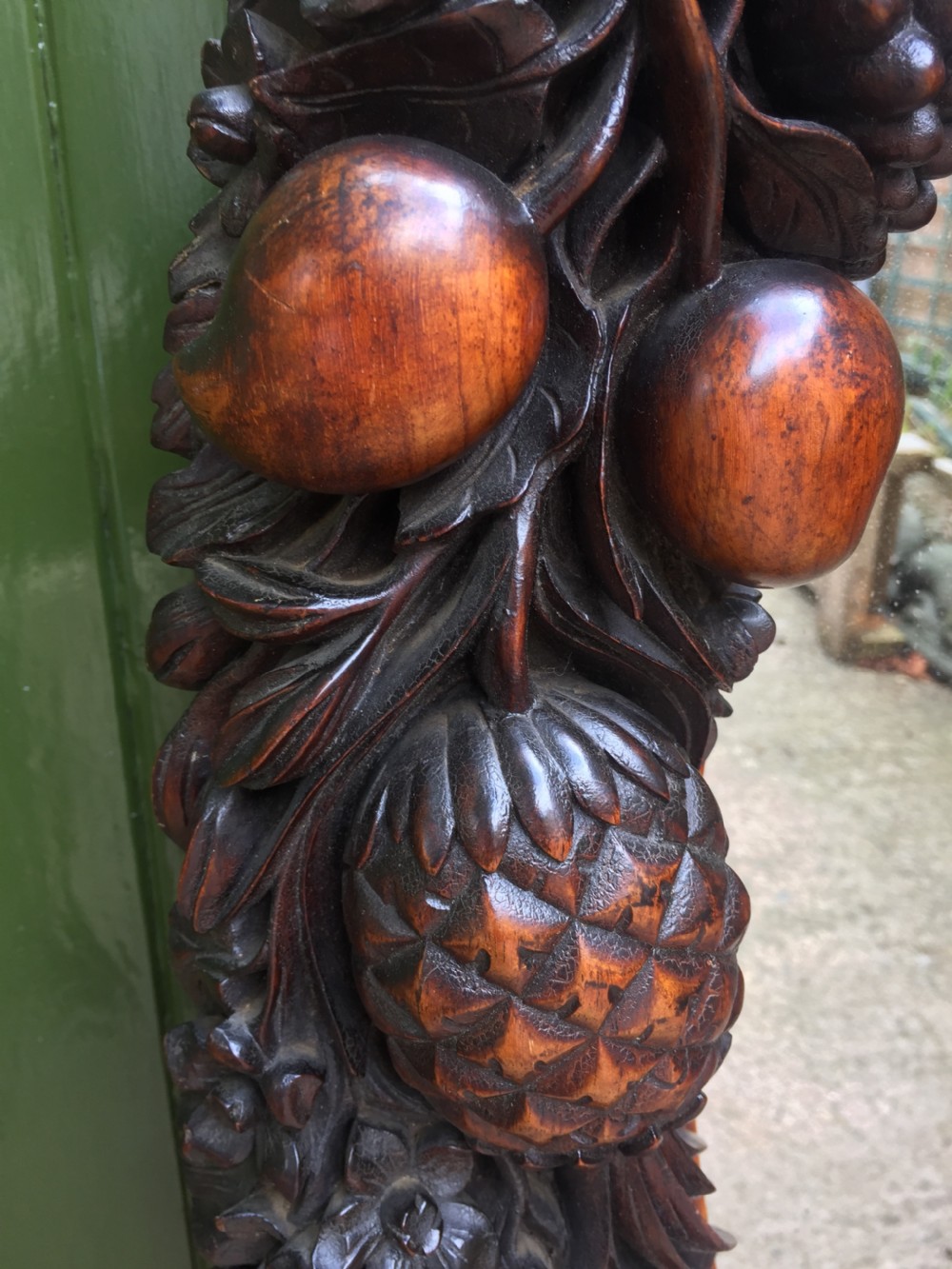 Exceptional mid C19th Indo-Portuguese carved rosewood or padauk framed oval mirror. View VII