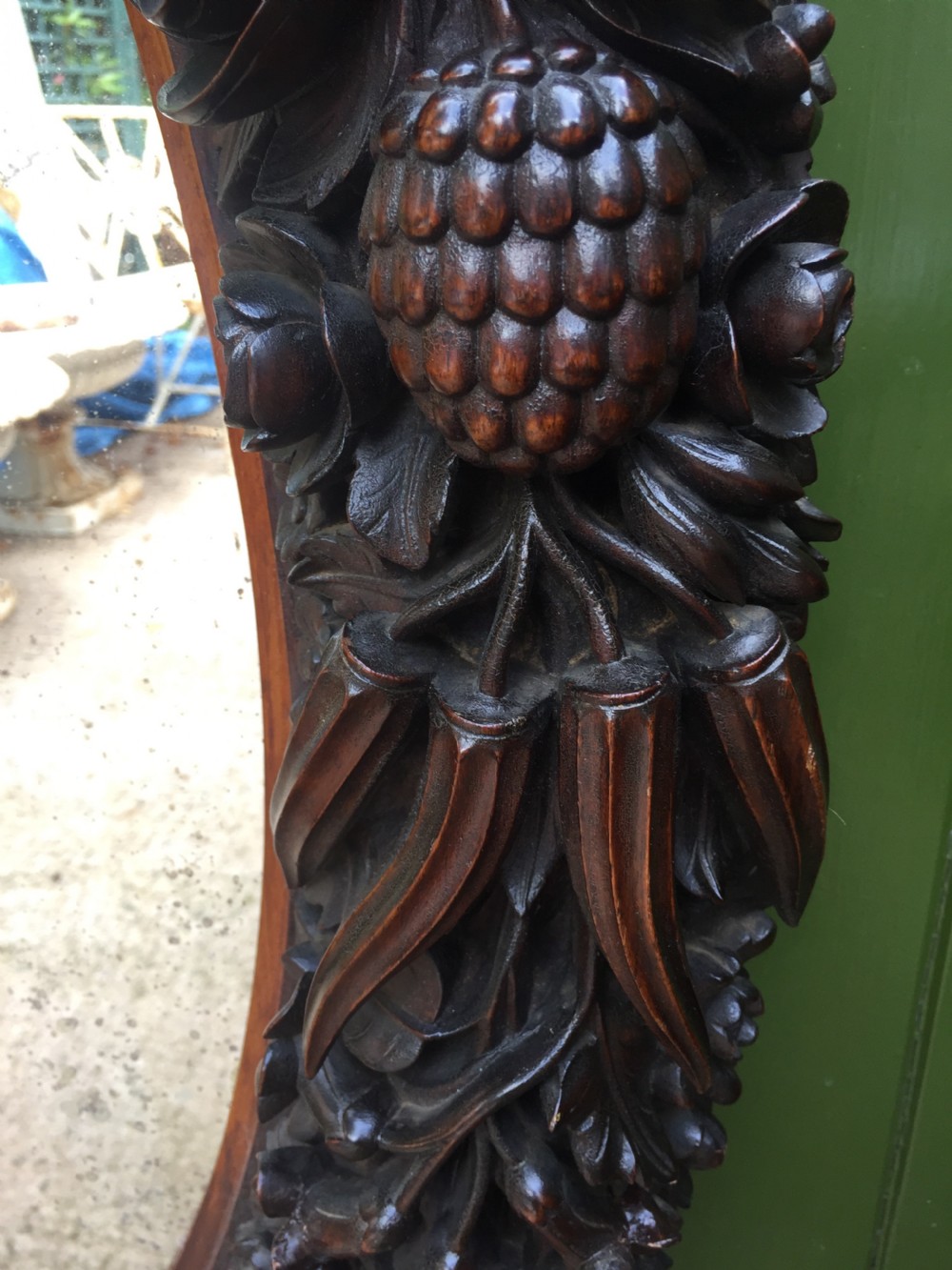Exceptional mid C19th Indo-Portuguese carved rosewood or padauk framed oval mirror. View VIII