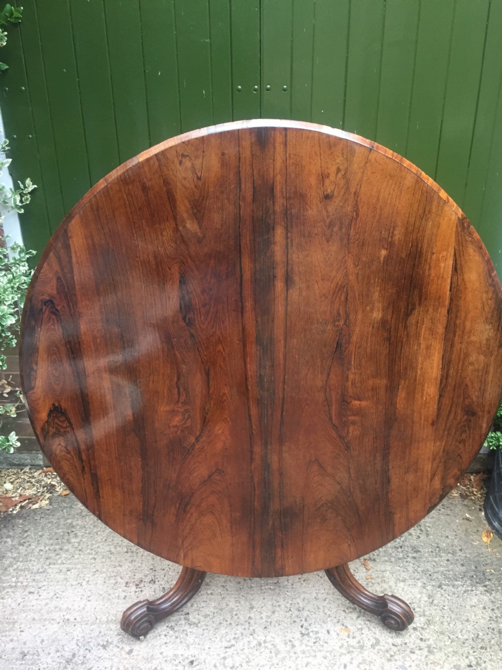 Mid C19th Victorian period figured rosewood circular centre or breakfast table on cabriole support base. View II