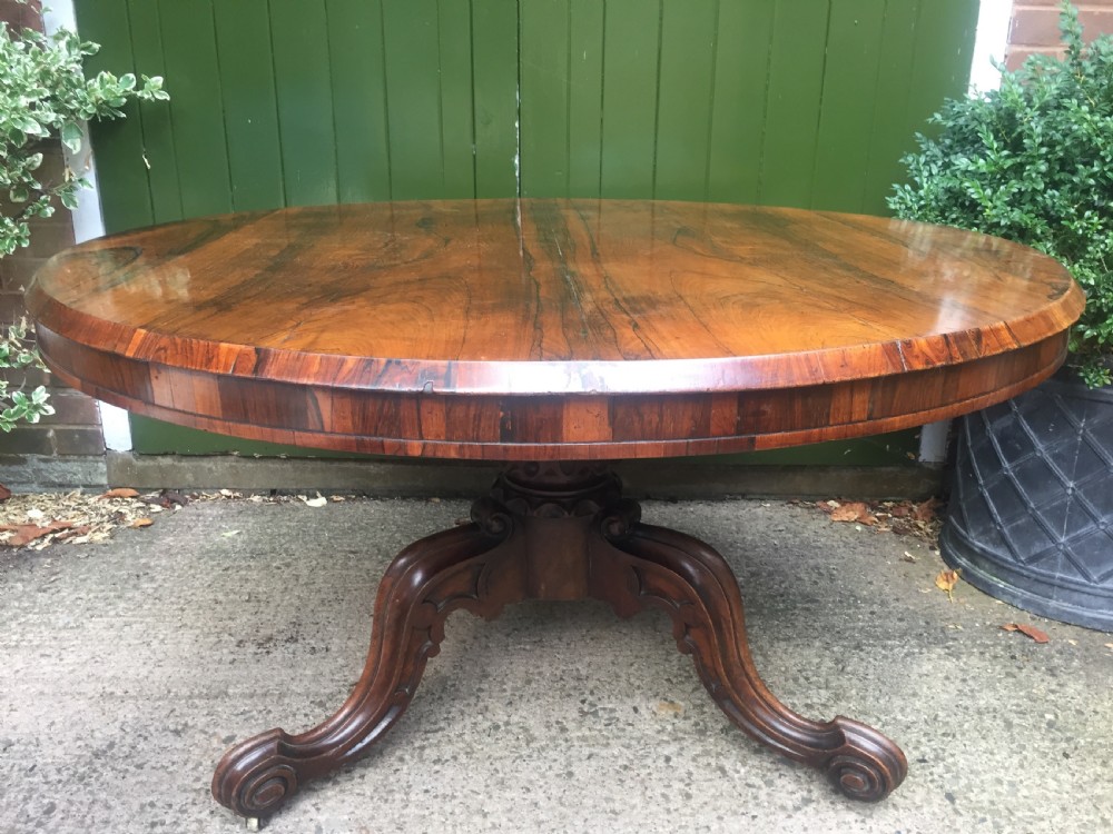 Mid C19th Victorian period figured rosewood circular centre or breakfast table on cabriole support base. View IV