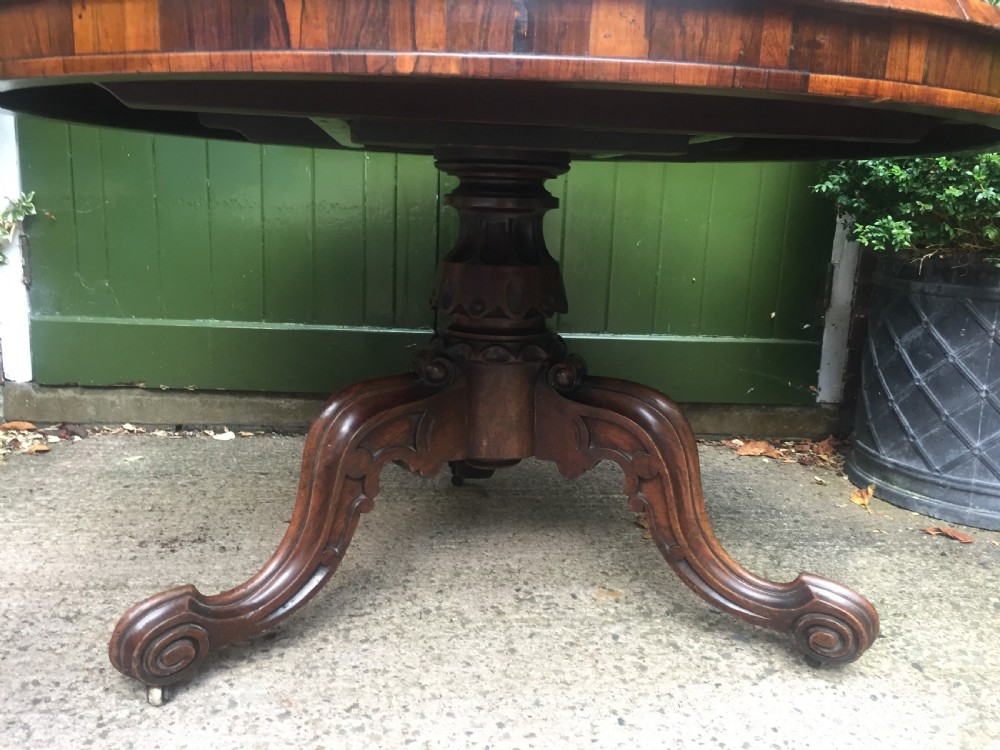 Mid C19th Victorian period figured rosewood circular centre or breakfast table on cabriole support base. View V