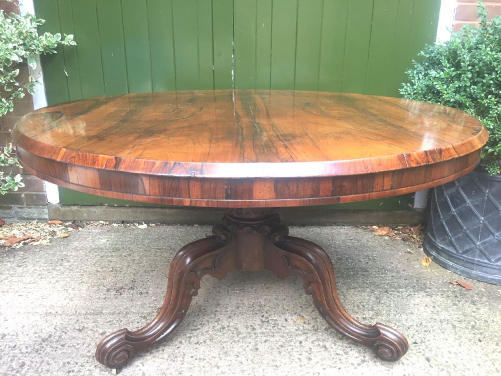 Mid C19th Victorian period figured rosewood circular centre or breakfast table on cabriole support base. View IX
