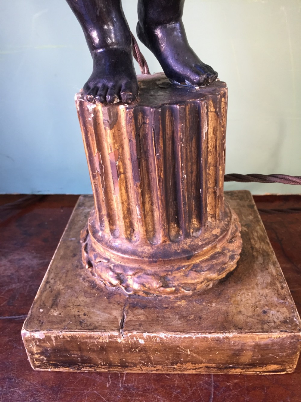 Pair of early C19th Italian carved wood amorini or cherubs modelled as lamps raised on truncated fluted column bases. View XI