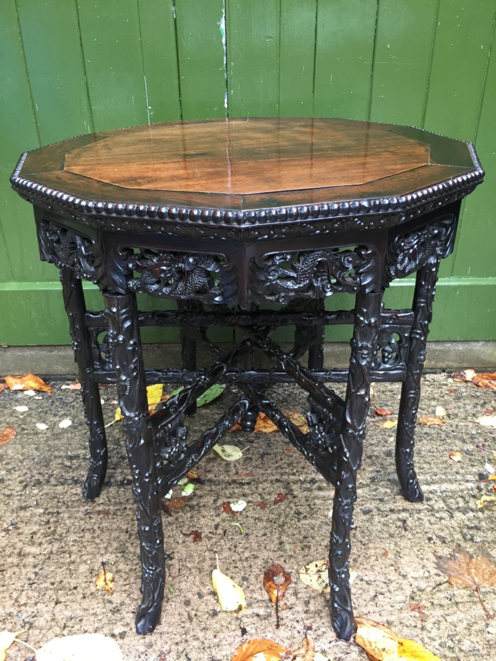 Superb quality late C19th Chinese Qing Dynasty carved hardwood occasional table on folding base.
