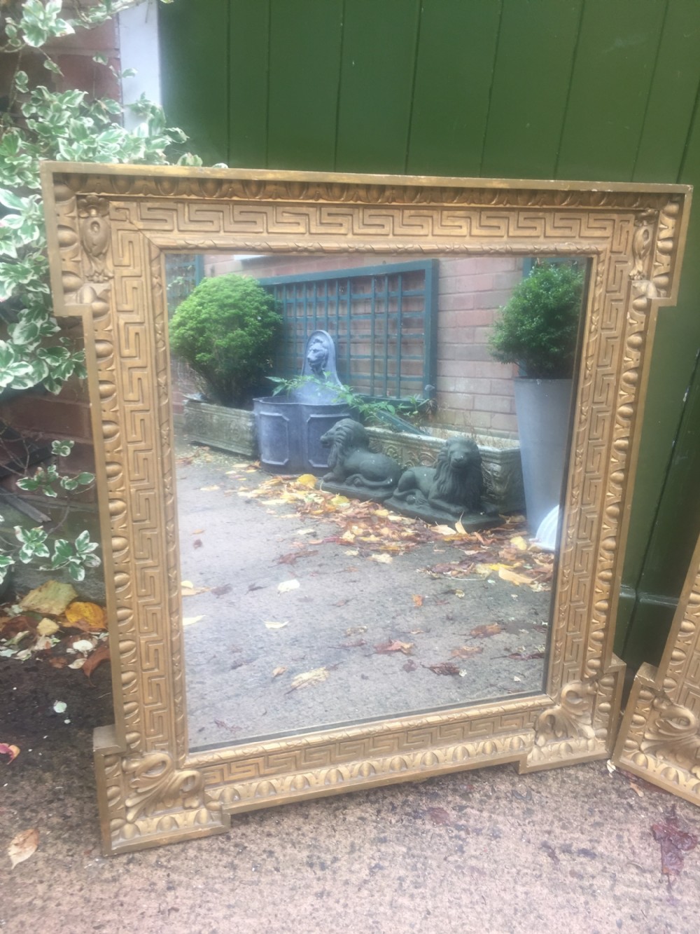 Pair of early C19th Georgian revival gilt-framed mirrors in the manner of William Kent in the Palladian architectural style . View IV