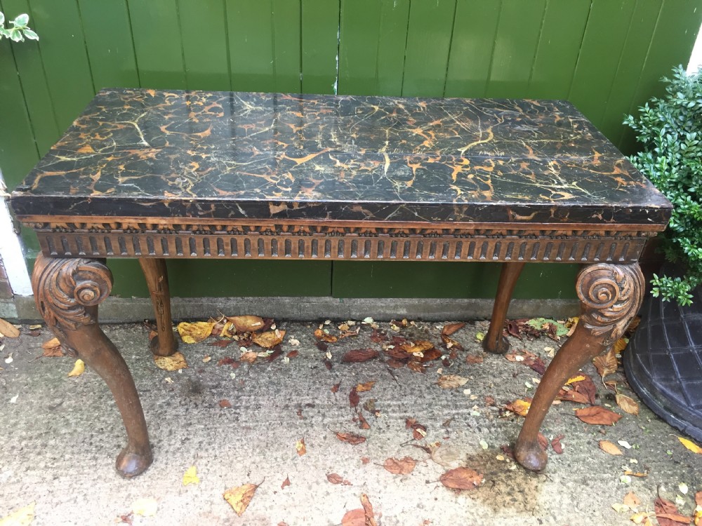 Interesting and decorative C18th George II period style carved and polished pine pier table with a faux marble slab top. View IV