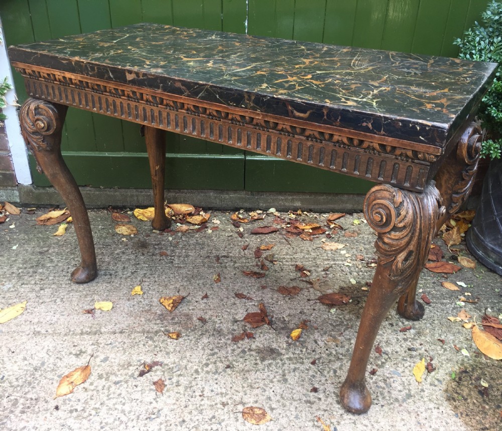Interesting and decorative C18th George II period style carved and polished pine pier table with a faux marble slab top. View VII