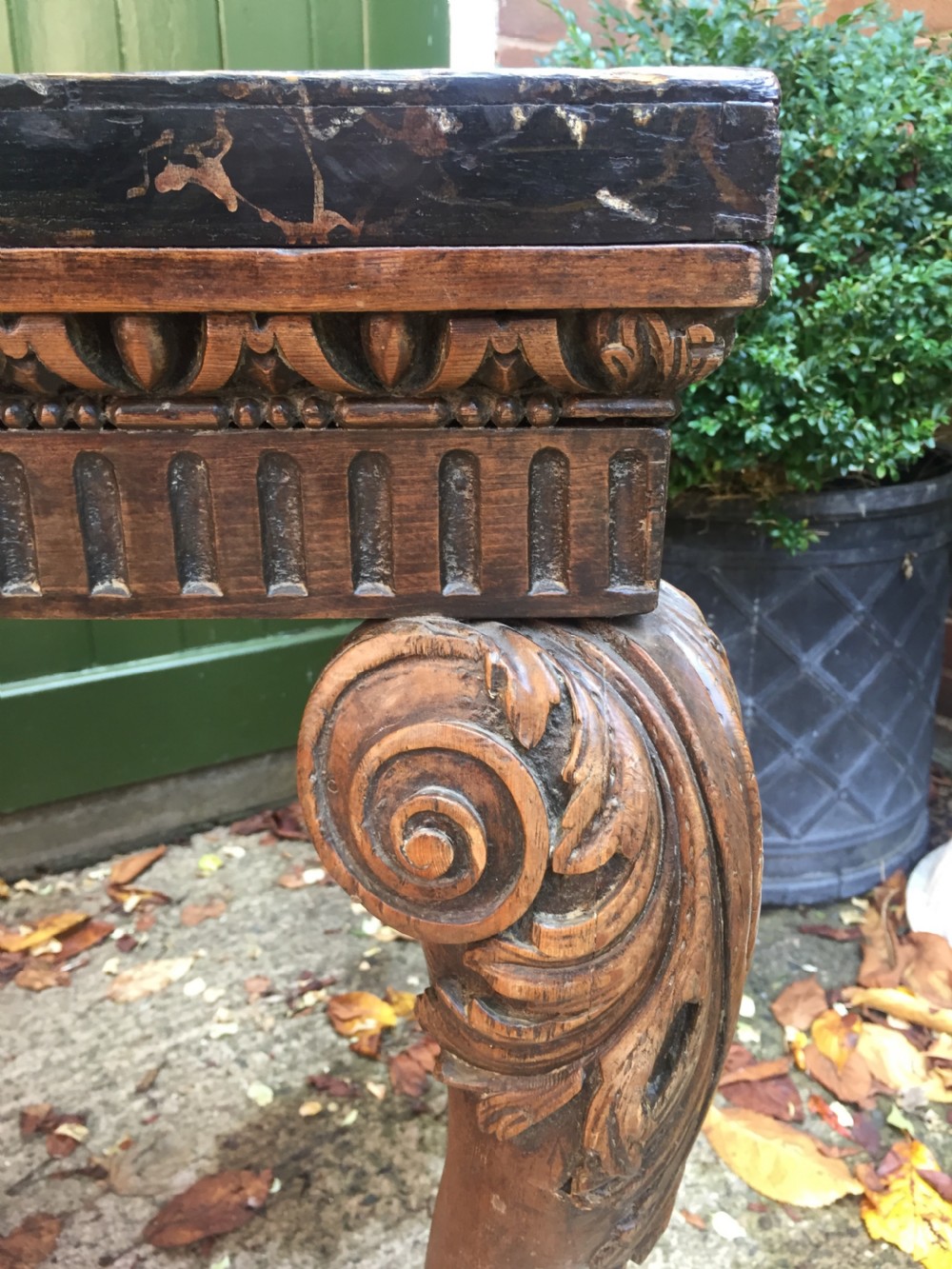 Interesting and decorative C18th George II period style carved and polished pine pier table with a faux marble slab top. View IX