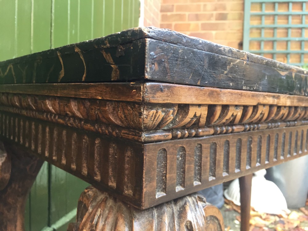Interesting and decorative C18th George II period style carved and polished pine pier table with a faux marble slab top. View XII