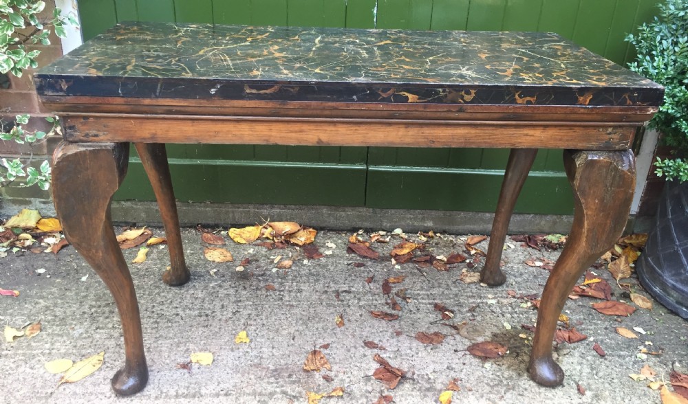 Interesting and decorative C18th George II period style carved and polished pine pier table with a faux marble slab top. View XV
