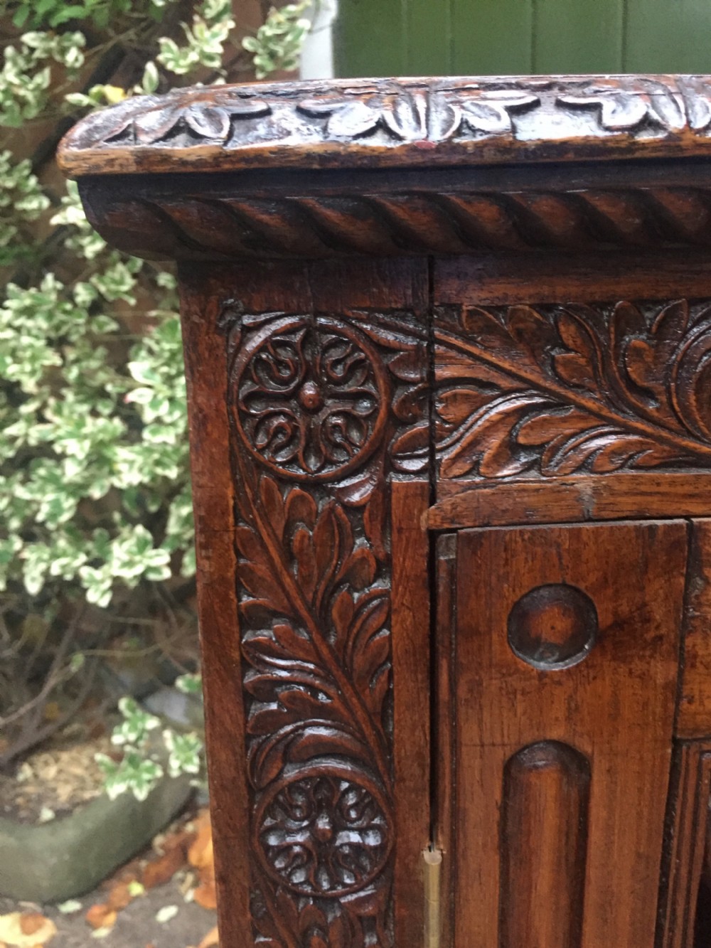 Mid C19th Anglo-Indian carved padauk or rosewood dwarf bookcase or side cabinet . View X