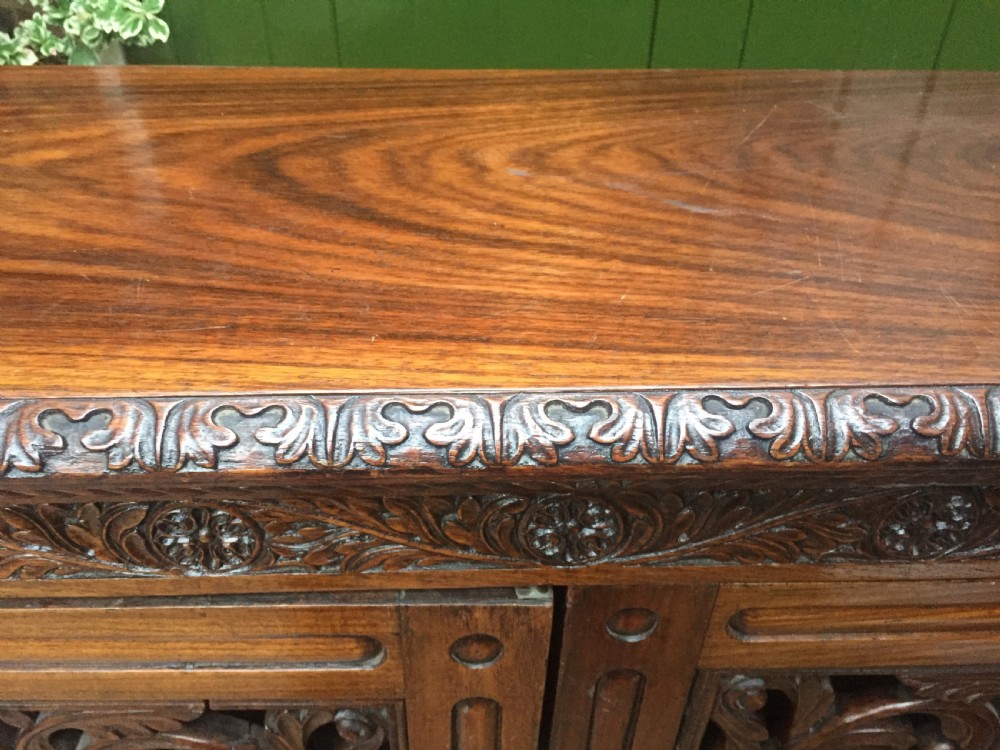 Mid C19th Anglo-Indian carved padauk or rosewood dwarf bookcase or side cabinet . View XIII