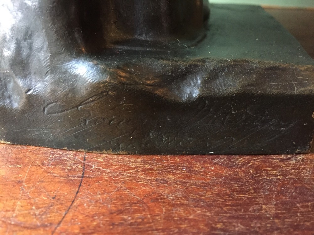 A late nineteenth-century dark bronze sculpture of the armless Venus de Milo standing on an integrated rectangular base. View XI