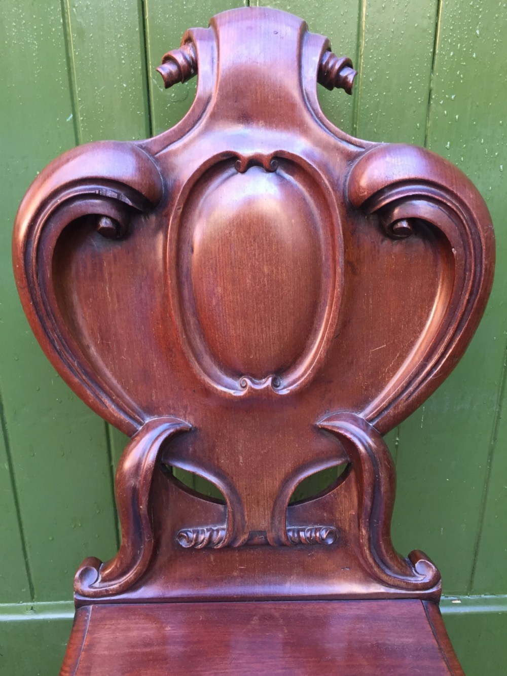 A high quality Victorian mahogany hall chair of particularly bold and flamboyant design  View IV