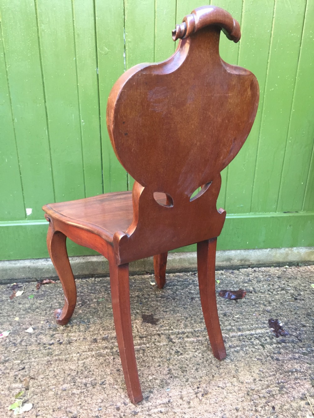 A high quality Victorian mahogany hall chair of particularly bold and flamboyant design  View VI