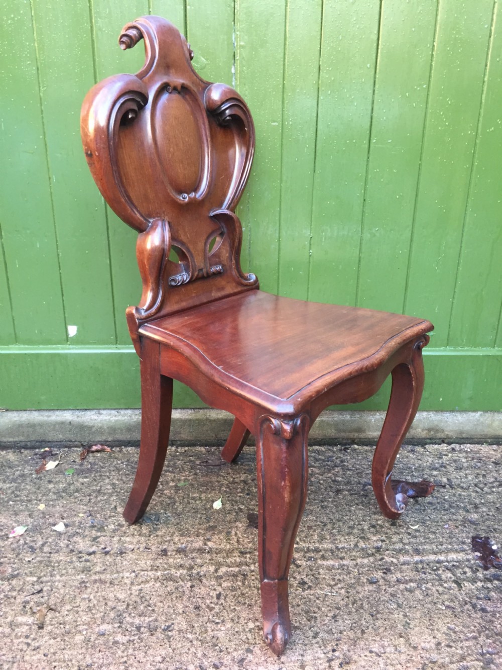 A high quality Victorian mahogany hall chair of particularly bold and flamboyant design  View VII