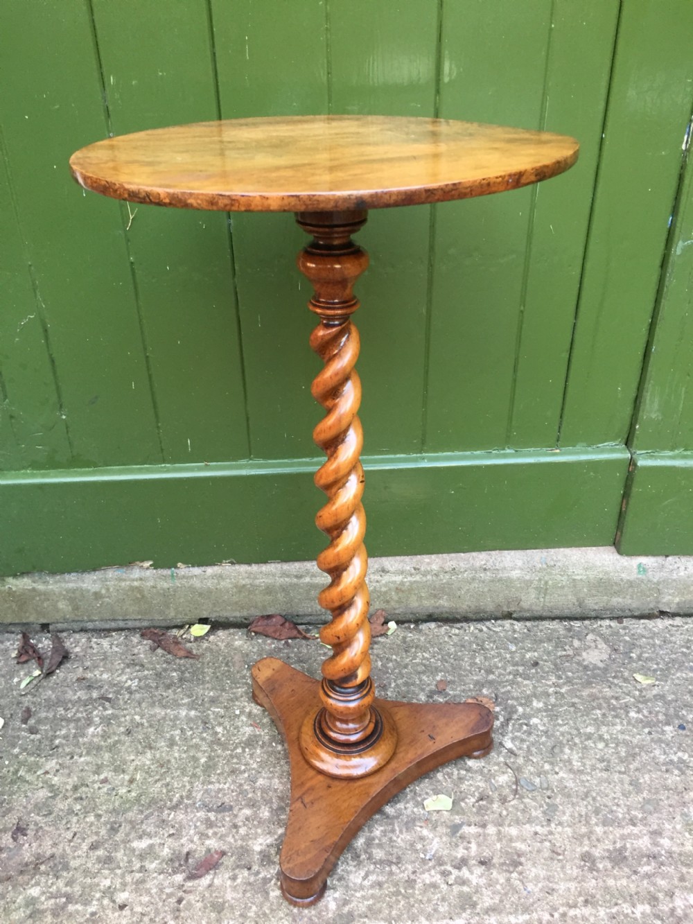Mid C19th walnut oval- topped wine table  or candlestand, by Charles Hindley & Sons London. View II
