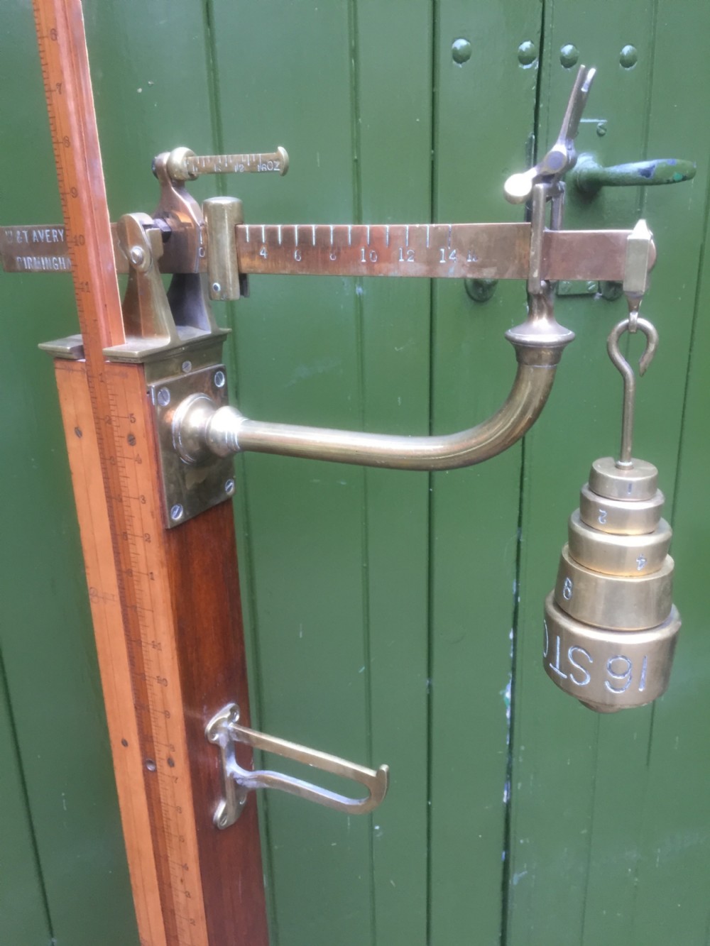 A set of late Victorian or Edwardian oak and brass floor-standing scales by W. & T. Avery Ltd. , Birmingham. View V