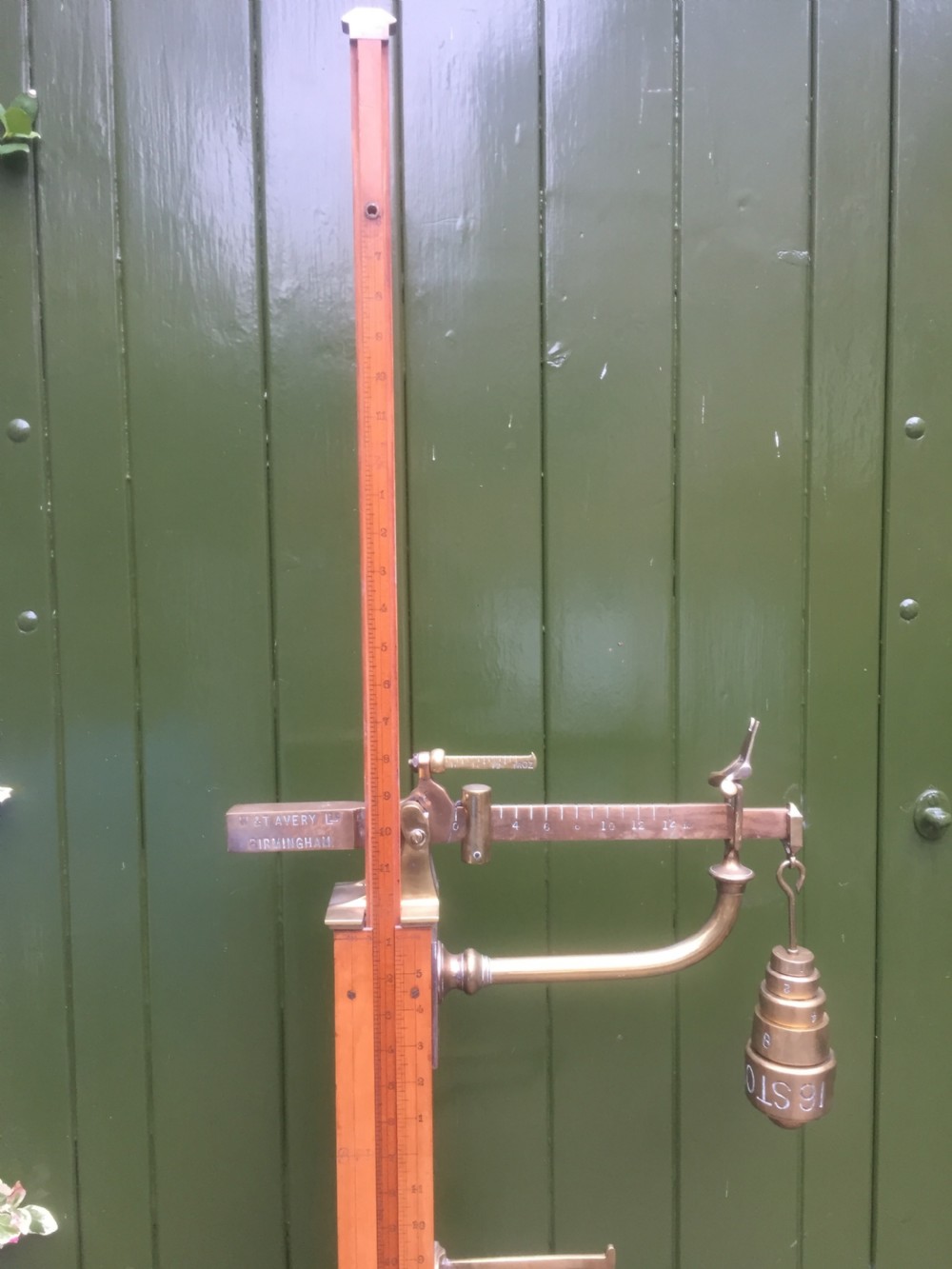 A set of late Victorian or Edwardian oak and brass floor-standing scales by W. & T. Avery Ltd. , Birmingham. View VI