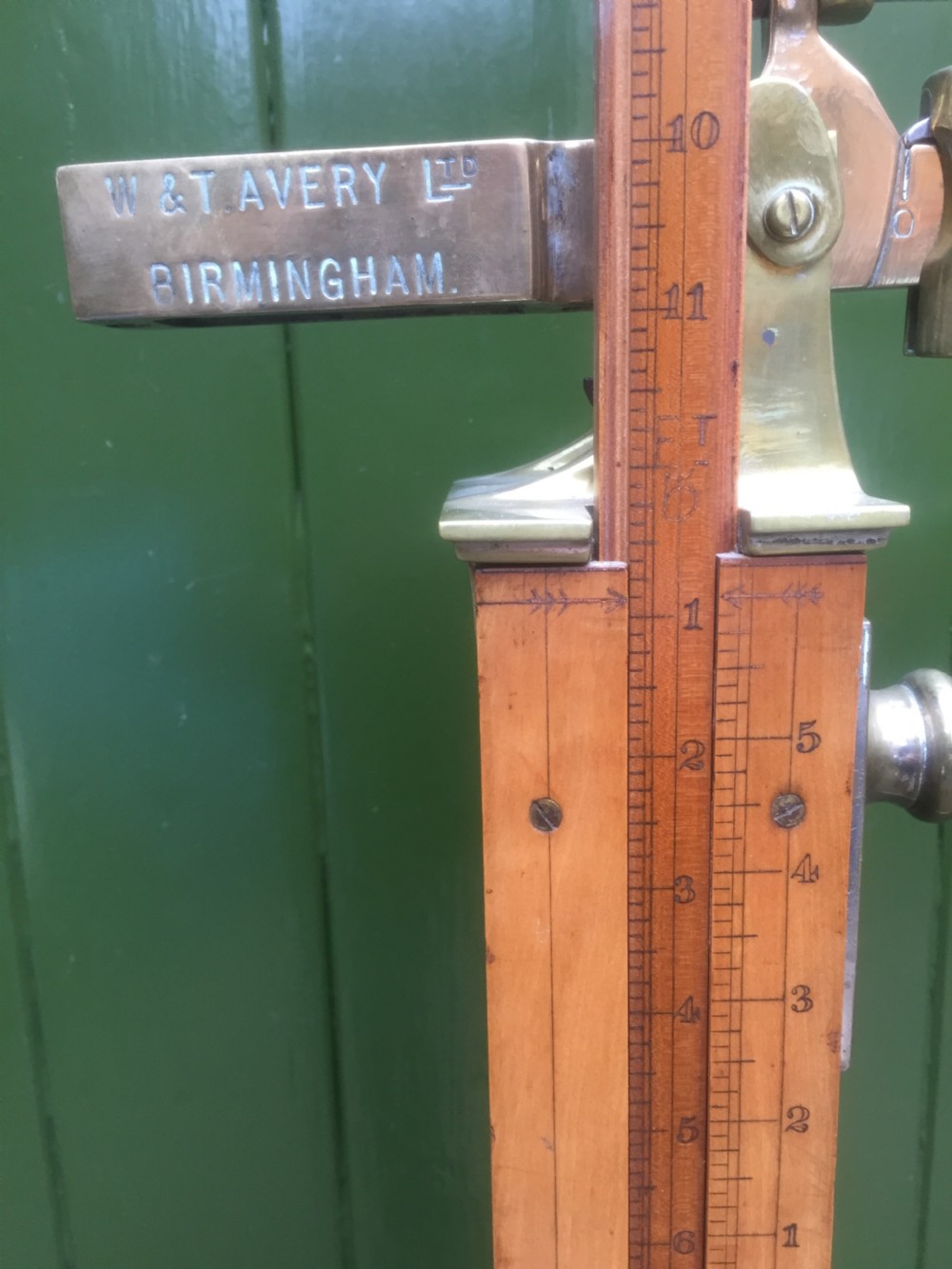 A set of late Victorian or Edwardian oak and brass floor-standing scales by W. & T. Avery Ltd. , Birmingham. View IX