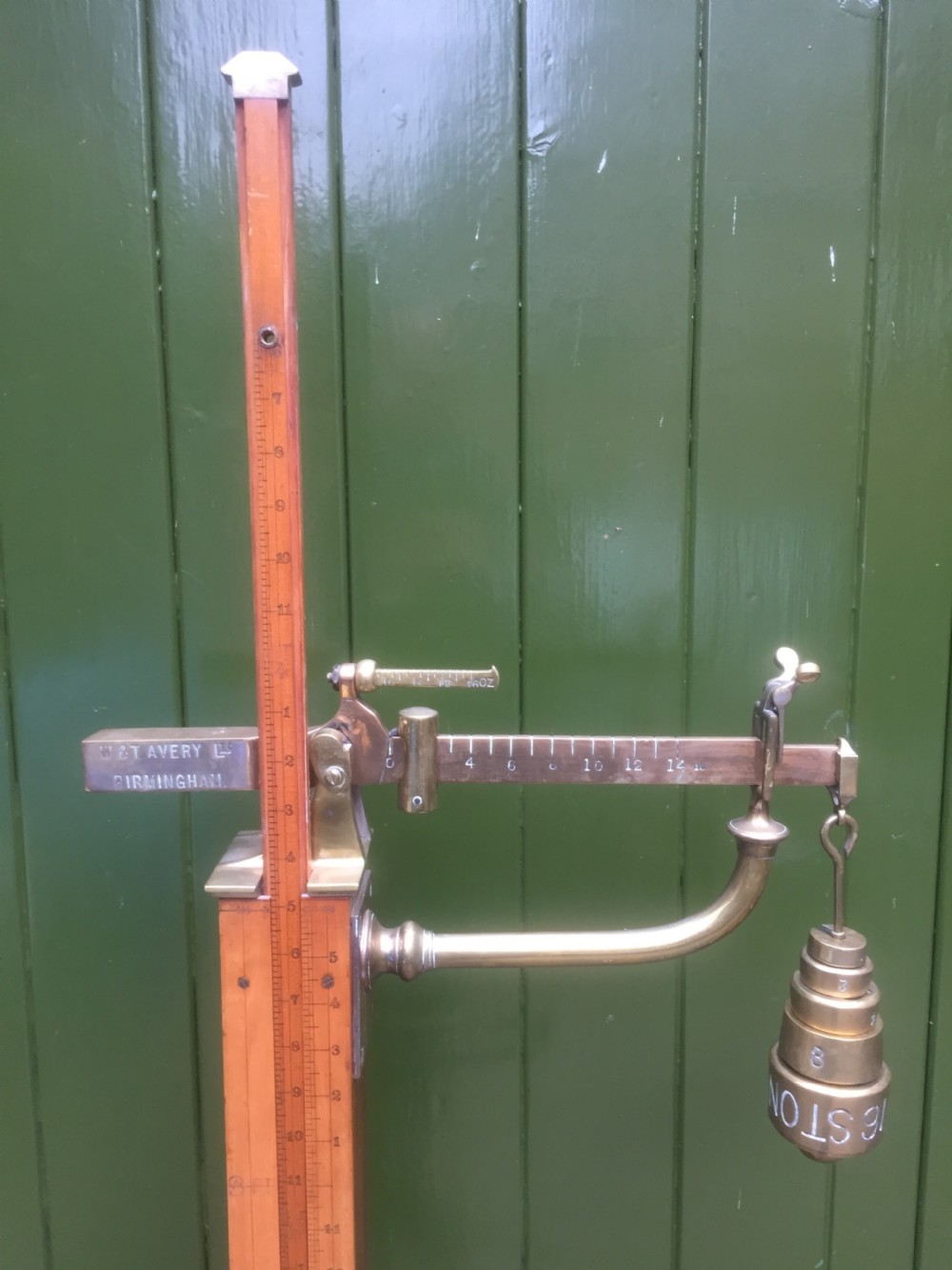 A set of late Victorian or Edwardian oak and brass floor-standing scales by W. & T. Avery Ltd. , Birmingham. View XII