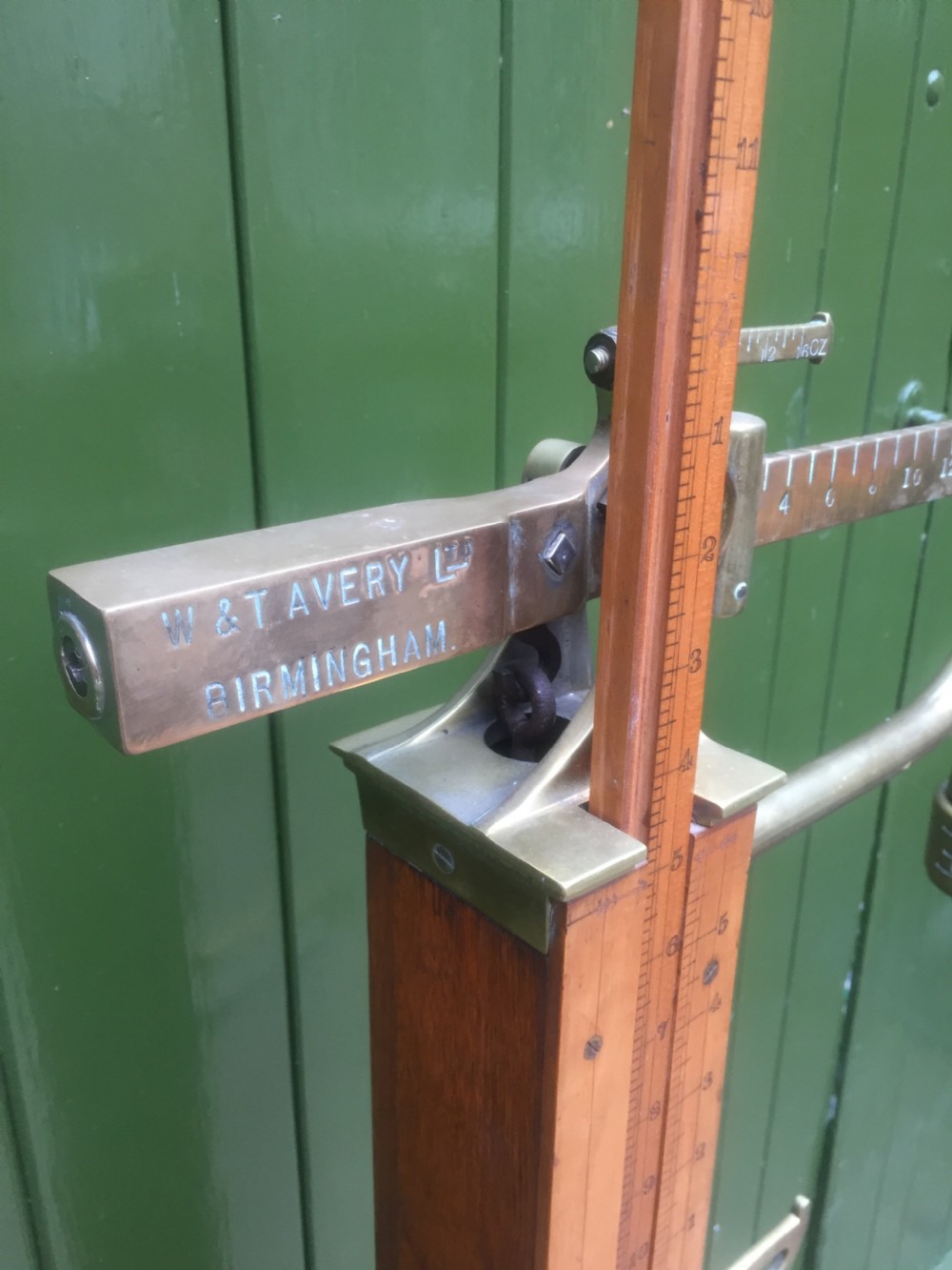 A set of late Victorian or Edwardian oak and brass floor-standing scales by W. & T. Avery Ltd. , Birmingham. View XIII