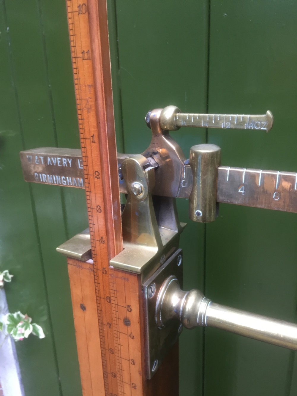 A set of late Victorian or Edwardian oak and brass floor-standing scales by W. & T. Avery Ltd. , Birmingham. View XIX