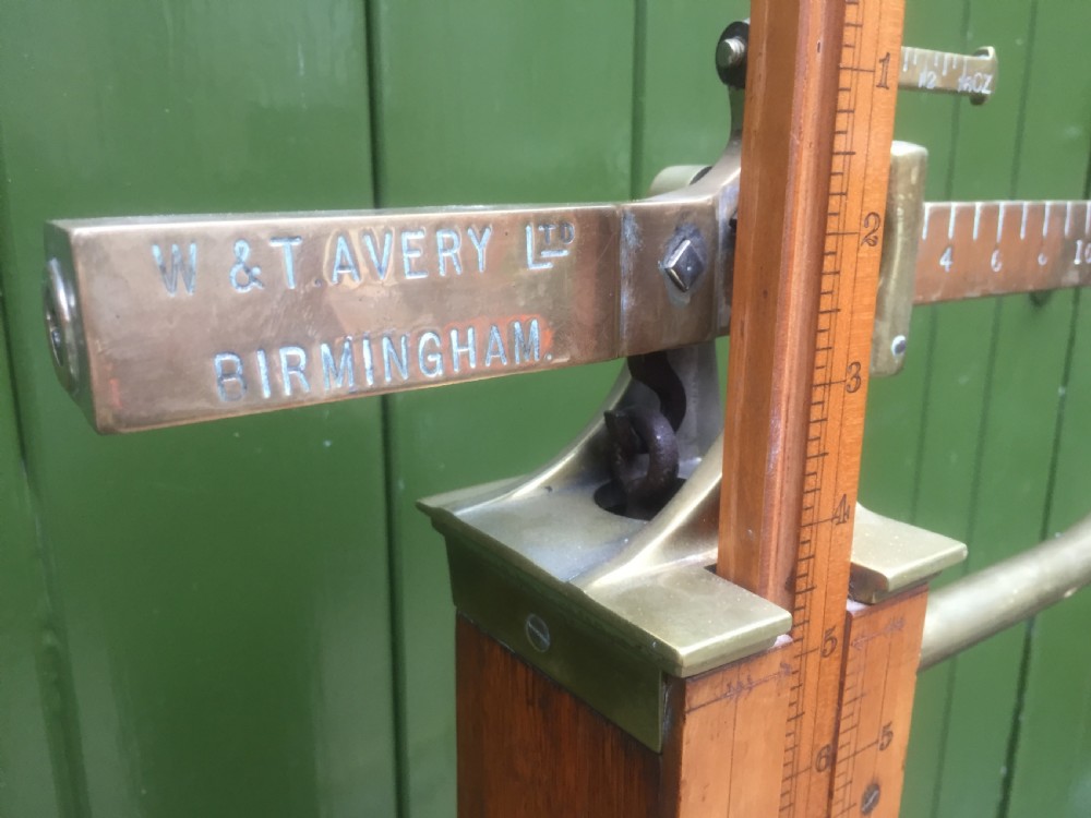 A set of late Victorian or Edwardian oak and brass floor-standing scales by W. & T. Avery Ltd. , Birmingham. View XX