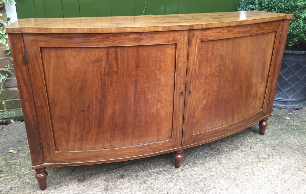 Elegant late C18th George III period mahogany bow-fronted 2-door side cabinet of restrained design and rare narrow proportions. View III