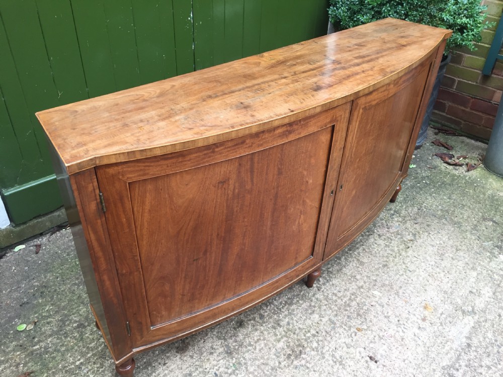 Elegant late C18th George III period mahogany bow-fronted 2-door side cabinet of restrained design and rare narrow proportions. View V