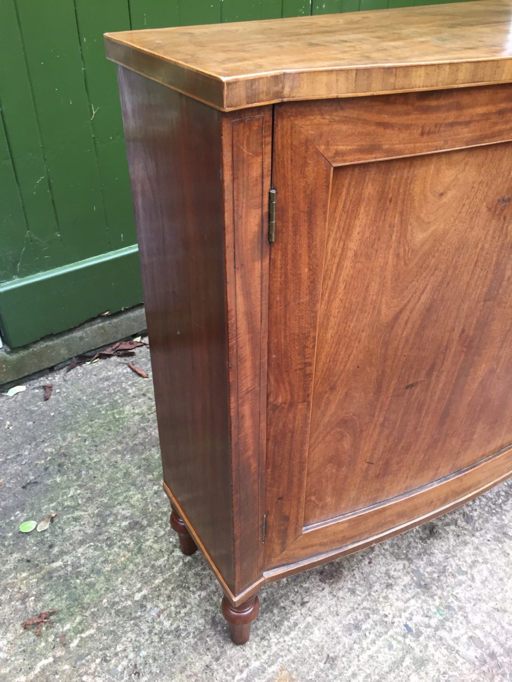 Elegant late C18th George III period mahogany bow-fronted 2-door side cabinet of restrained design and rare narrow proportions. View VII