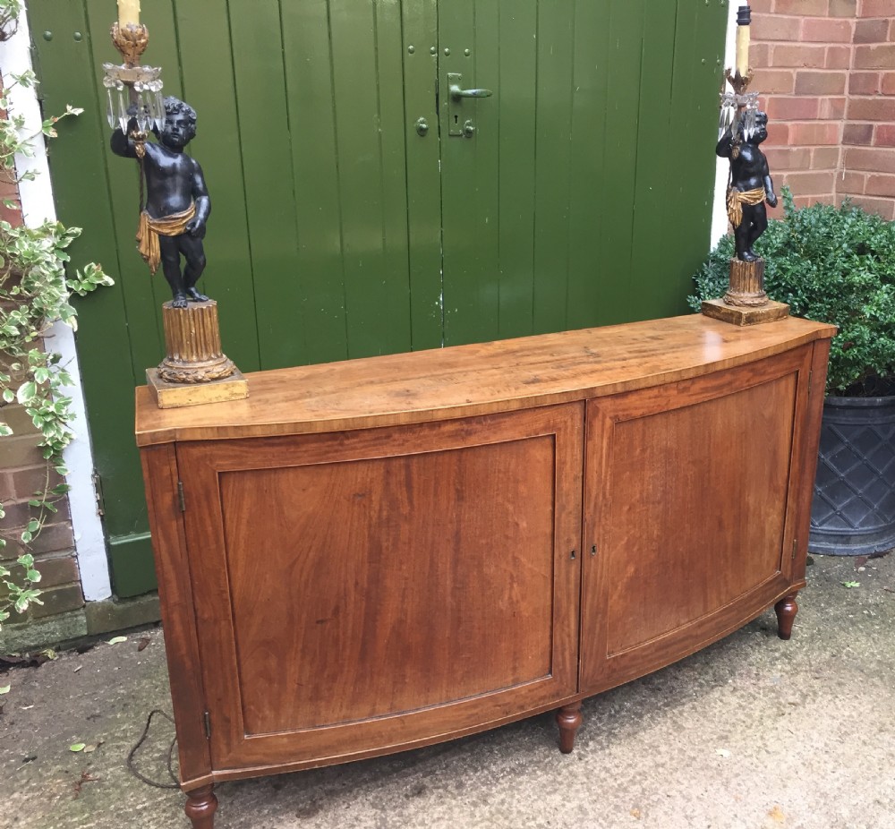 Elegant late C18th George III period mahogany bow-fronted 2-door side cabinet of restrained design and rare narrow proportions. View XVII
