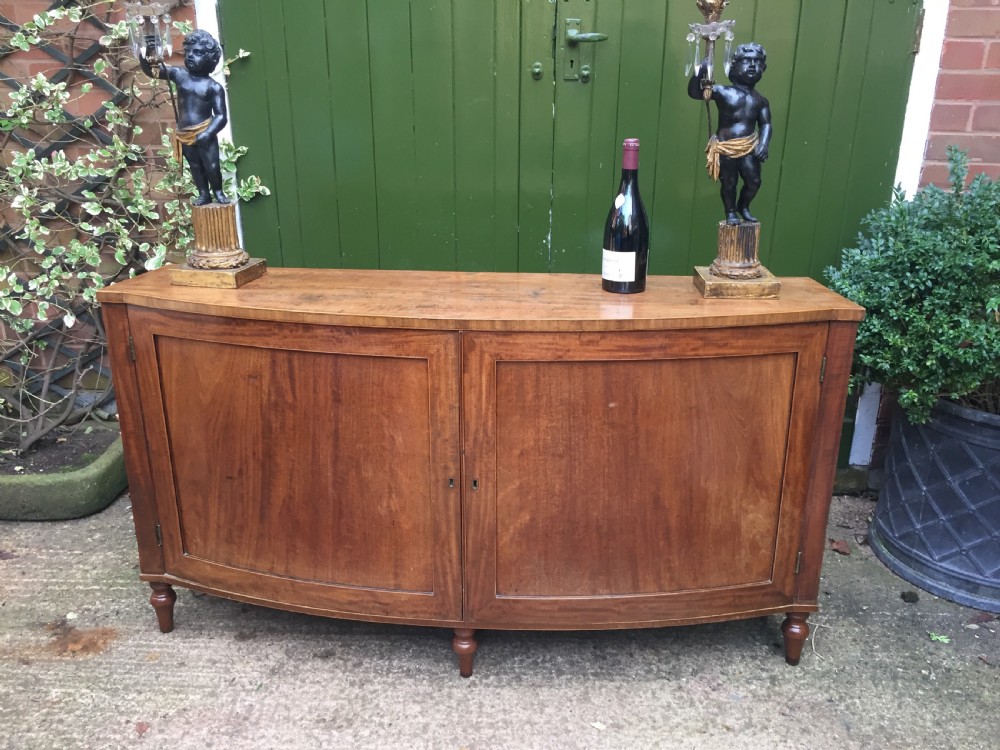 Elegant late C18th George III period mahogany bow-fronted 2-door side cabinet of restrained design and rare narrow proportions. View XX