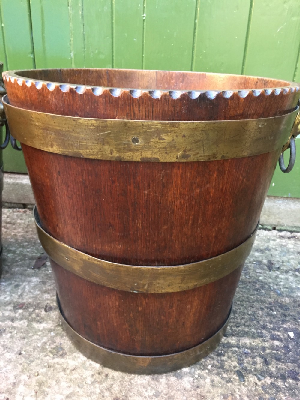 Pair of early C19th brass-bound oak log or peat fireside buckets fitted with brass lions-mask ring handles . View VI