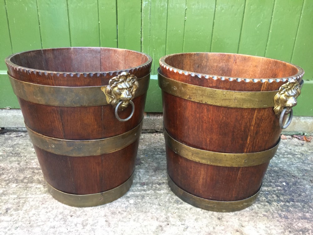 Pair of early C19th brass-bound oak log or peat fireside buckets fitted with brass lions-mask ring handles . View VII